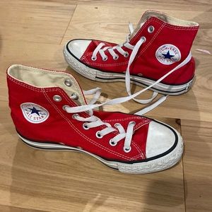 Red high top Converse sneakers